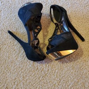 Black and gold heels